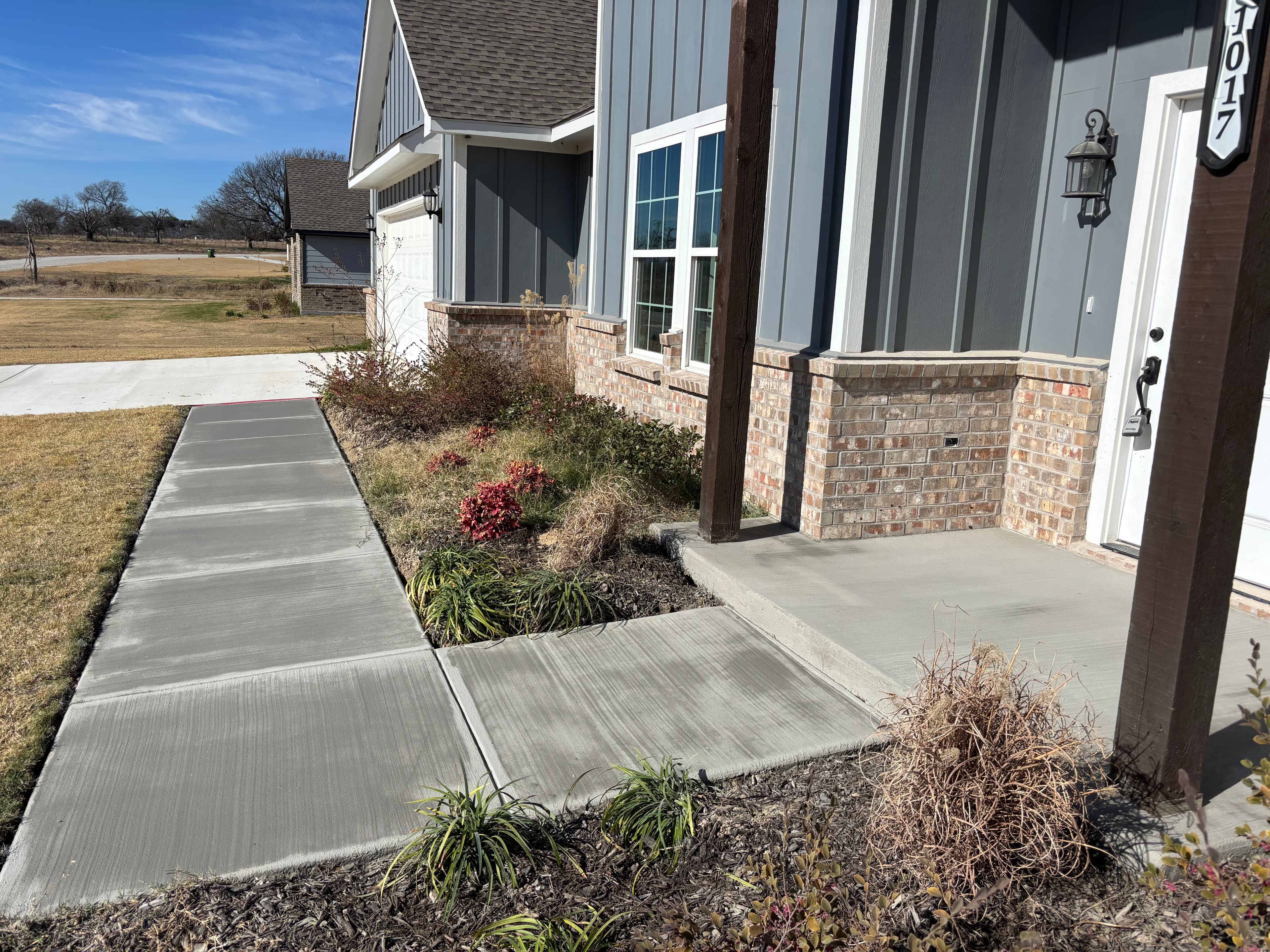 Concrete walkway after resurfacing overlay in North Texas