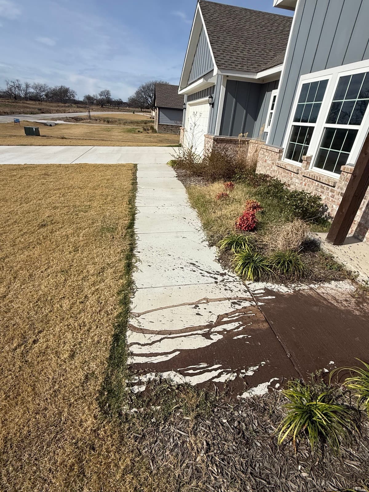 Concrete walkway before resurfacing overlay in North Texas