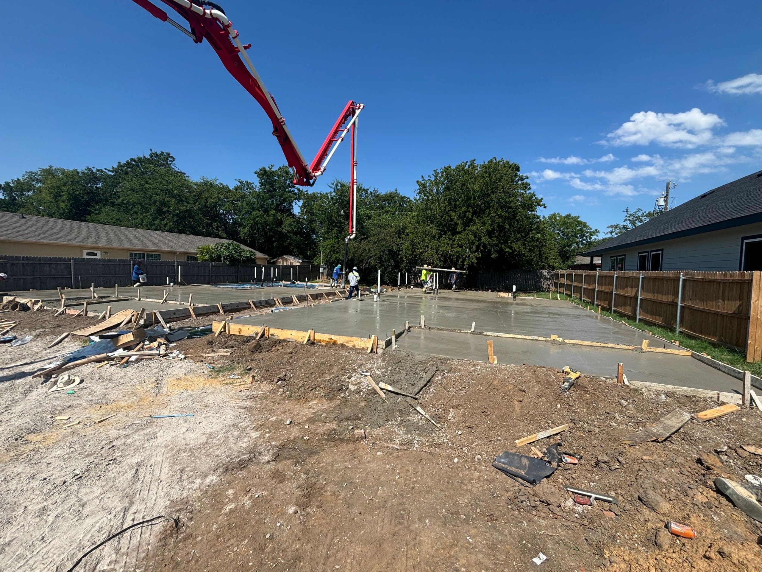 Residential foundation slab pour with pump truck